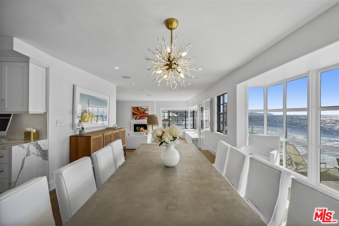 31500 Victoria Point Road Malibu, CA 90265 - Photo 10 of 53 a view of living room with furniture and chandelier