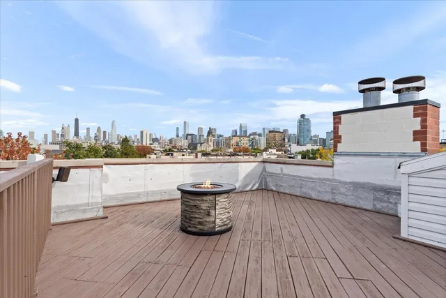 a view of city from terrace with seating space
