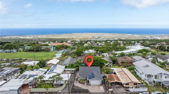 an aerial view of a city with lots of residential buildings