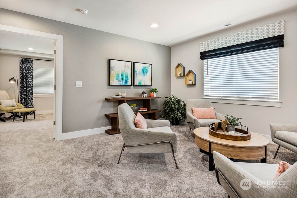19 177th St S West Bothell, WA 98012 - Photo 15 of 29 a living room with furniture and a window