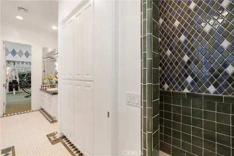 an empty room with closet area