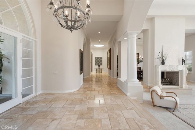 a view of a hallway with windows