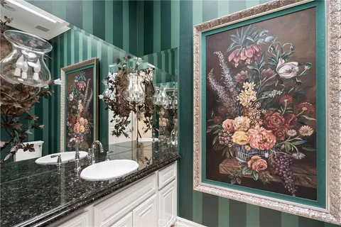 a view of a livingroom with furniture and a chandelier