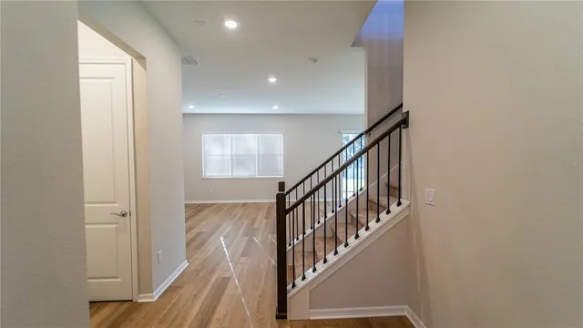 a view of entryway with wooden floor