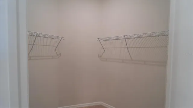 an empty room with a bathroom
