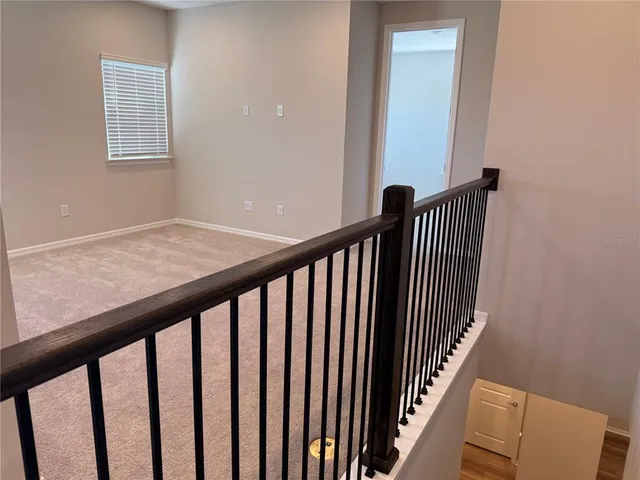 a view of a hallway with entryway