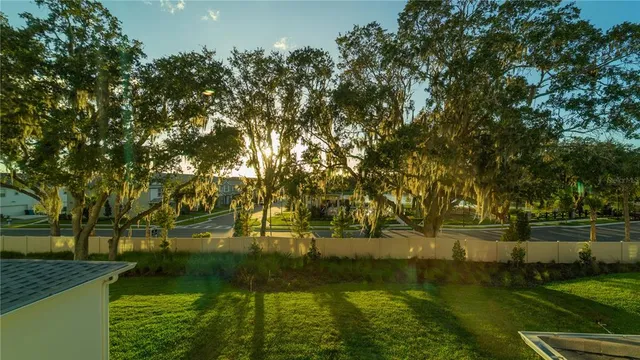 a bathroom with a shower and toilet