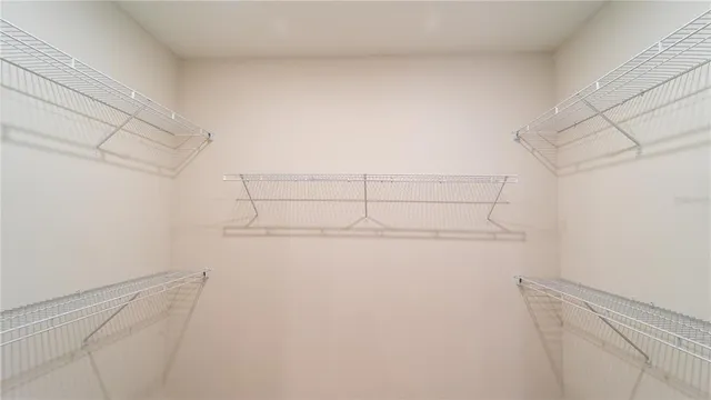 a front view of a house with a yard table and chairs