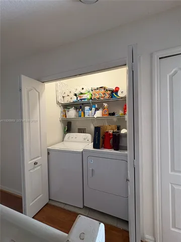 a view of storage and utility room