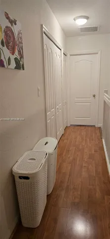 a bathroom with a sink and shower