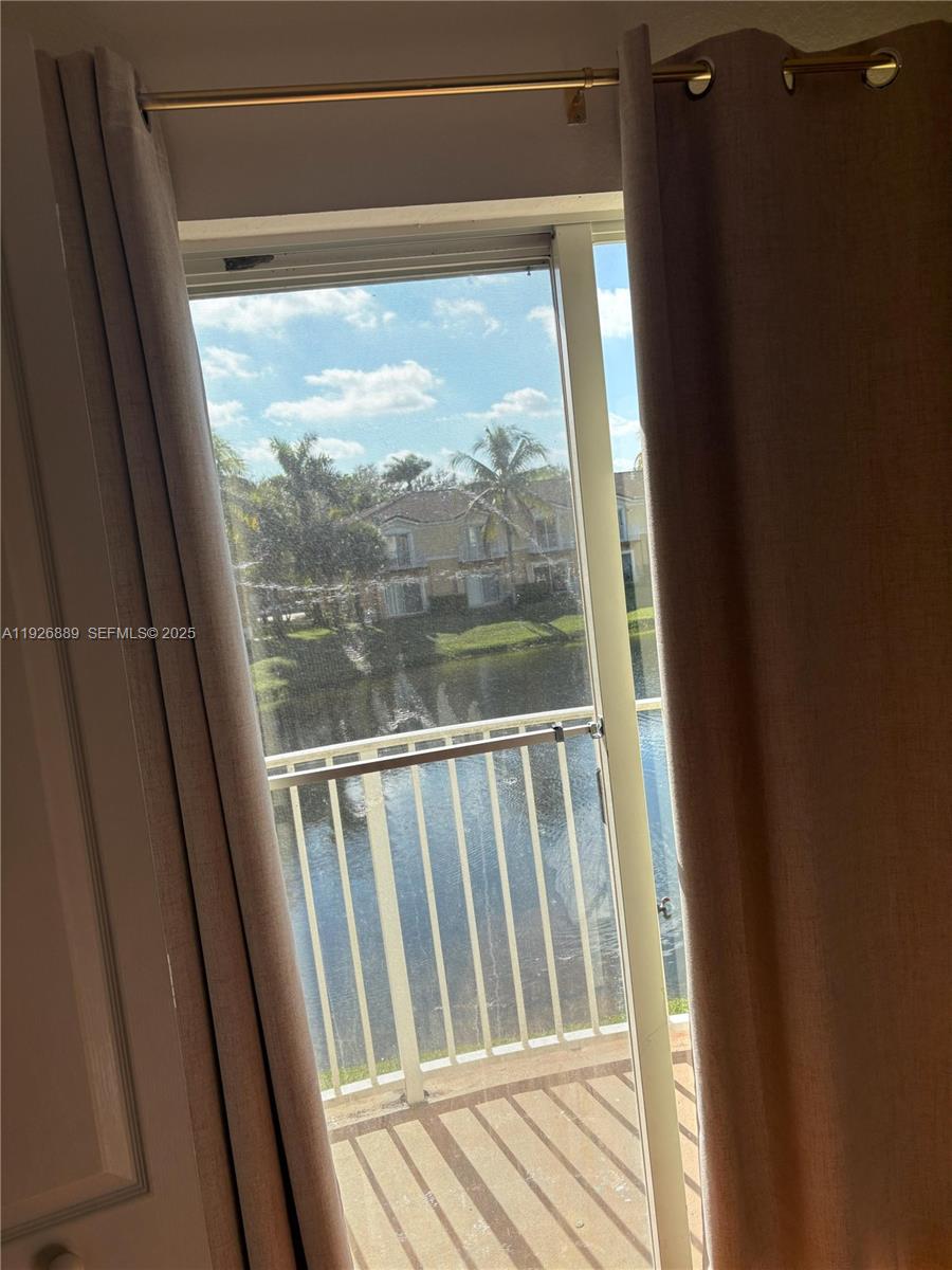 12842 Southwest 31st Street, Unit 134 Miramar, FL 33027 - Photo 25 of 30 a view of a porch