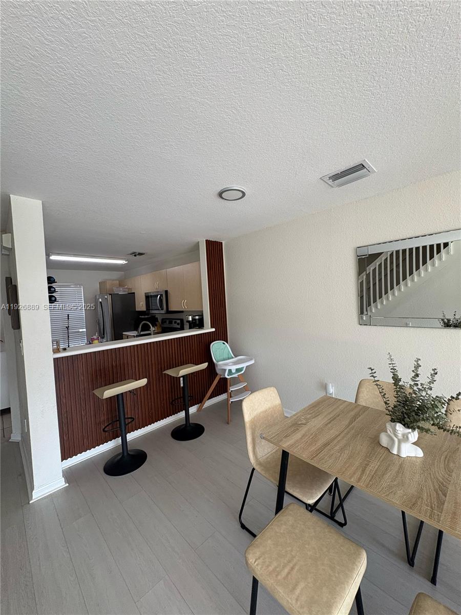 12842 Southwest 31st Street, Unit 134 Miramar, FL 33027 - Photo 10 of 30 a living room with furniture