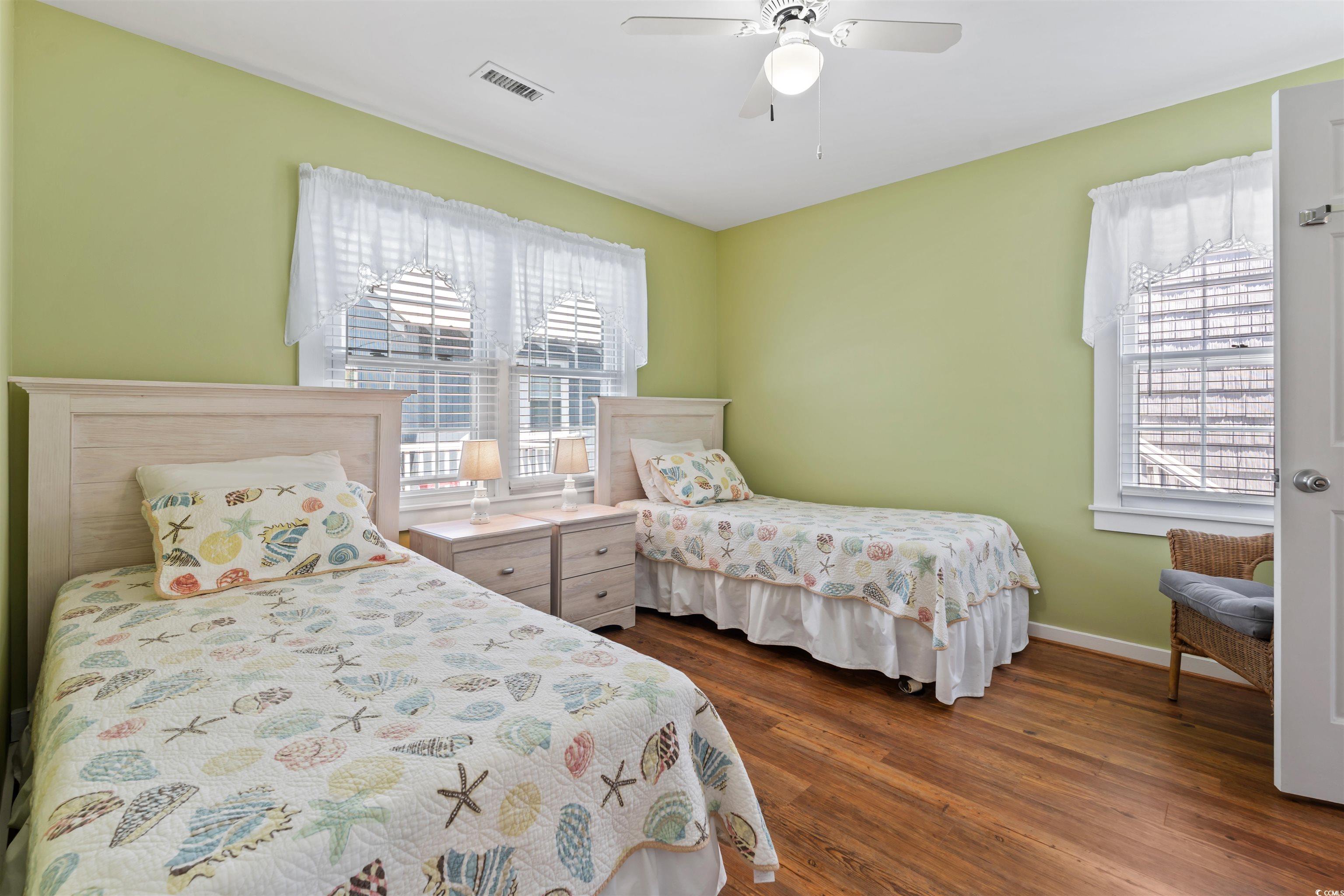 161 Easy Street Murrells Inlet, SC 29576 - Photo 14 of 40 Bedroom with dark wood-style flooring, and a ceiling fan