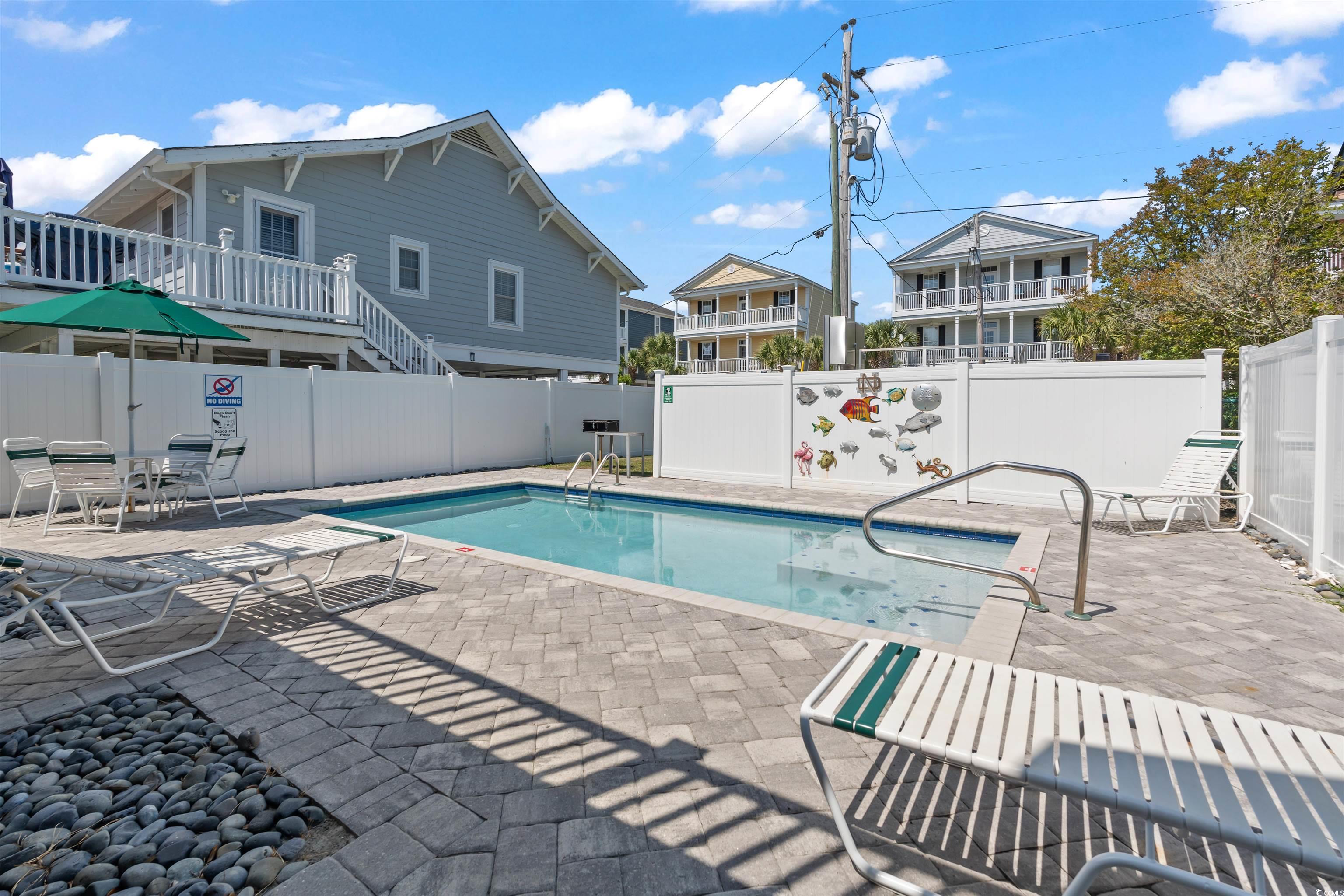 161 Easy Street Murrells Inlet, SC 29576 - Photo 25 of 40 View of swimming pool with a fenced backyard and a grilling patio area