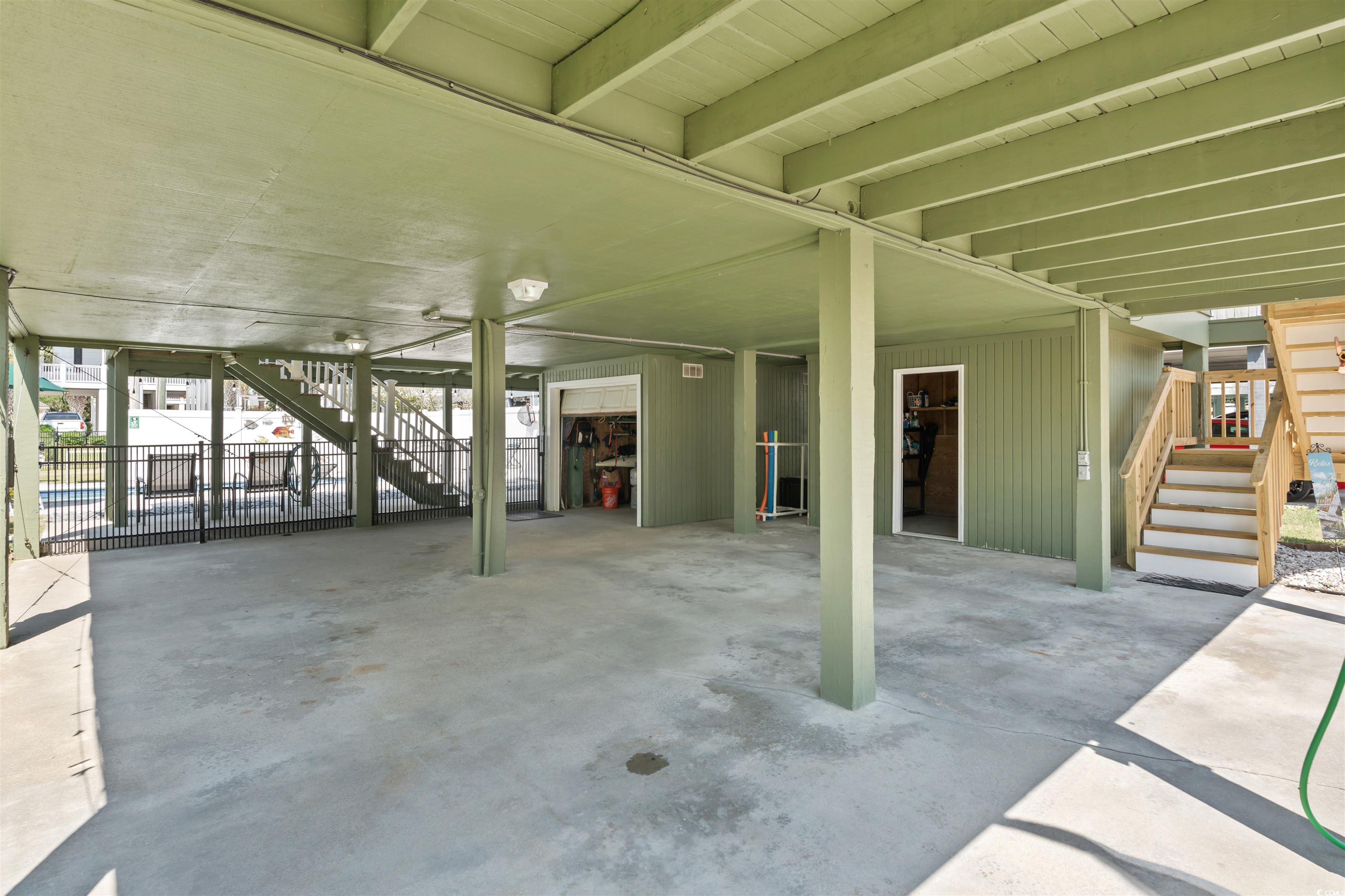 161 Easy Street Murrells Inlet, SC 29576 - Photo 29 of 40 View of patio featuring stairway and a carport