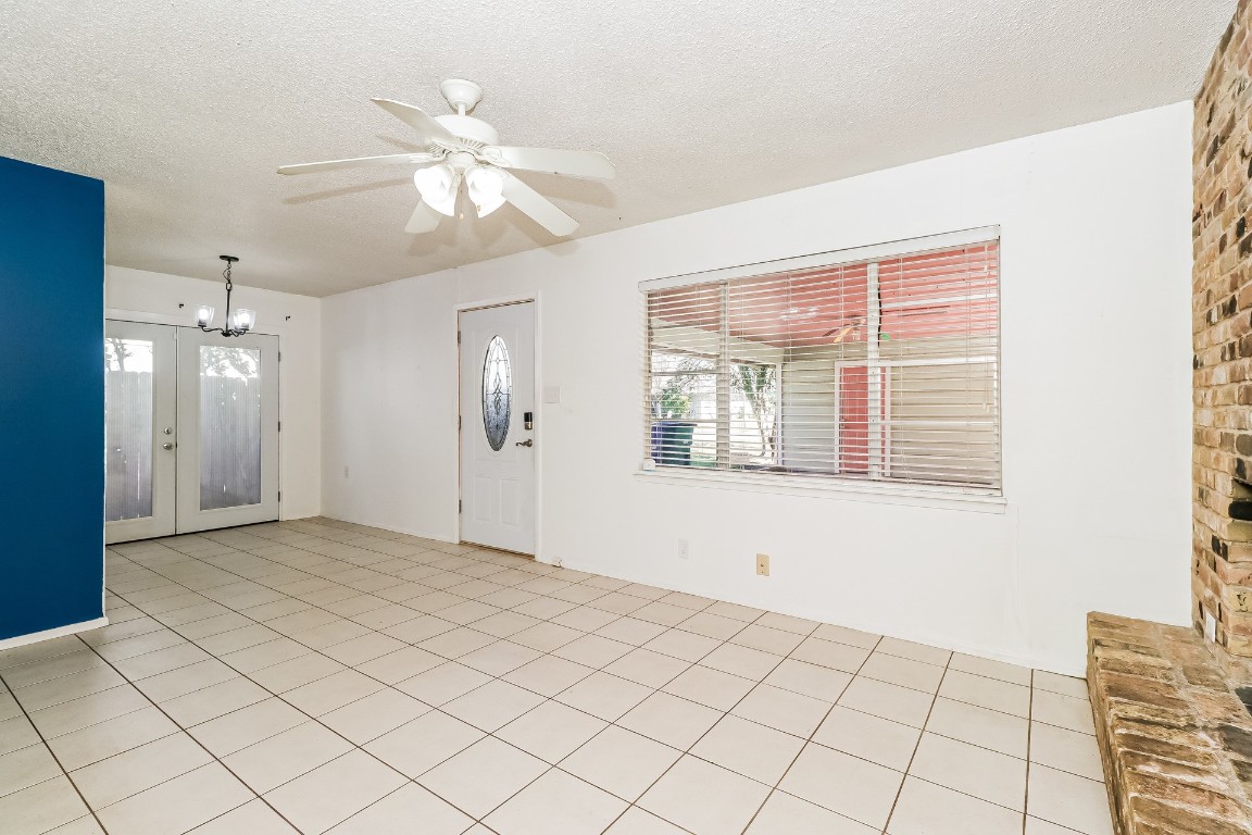 8116 Exmoor Drive, Unit B Austin, TX 78757 - Photo 5 of 15 a view of an empty room and window