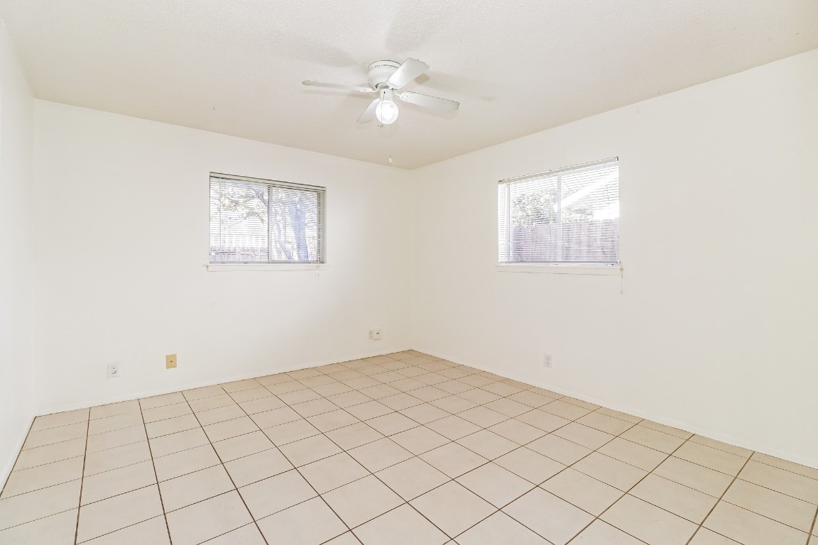 8116 Exmoor Drive, Unit B Austin, TX 78757 - Photo 10 of 15 a view of an empty room with a window