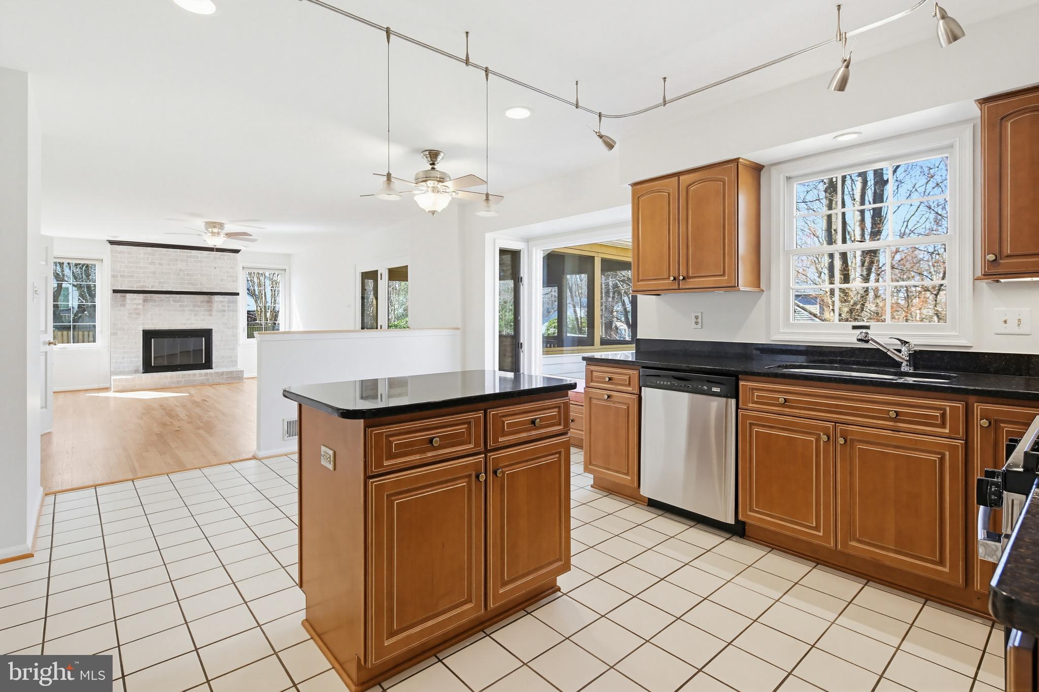 8307 Spring Blossom Court Laurel, MD 20723 - Photo 17 of 69 a kitchen with stainless steel appliances granite countertop a stove a sink and a refrigerator