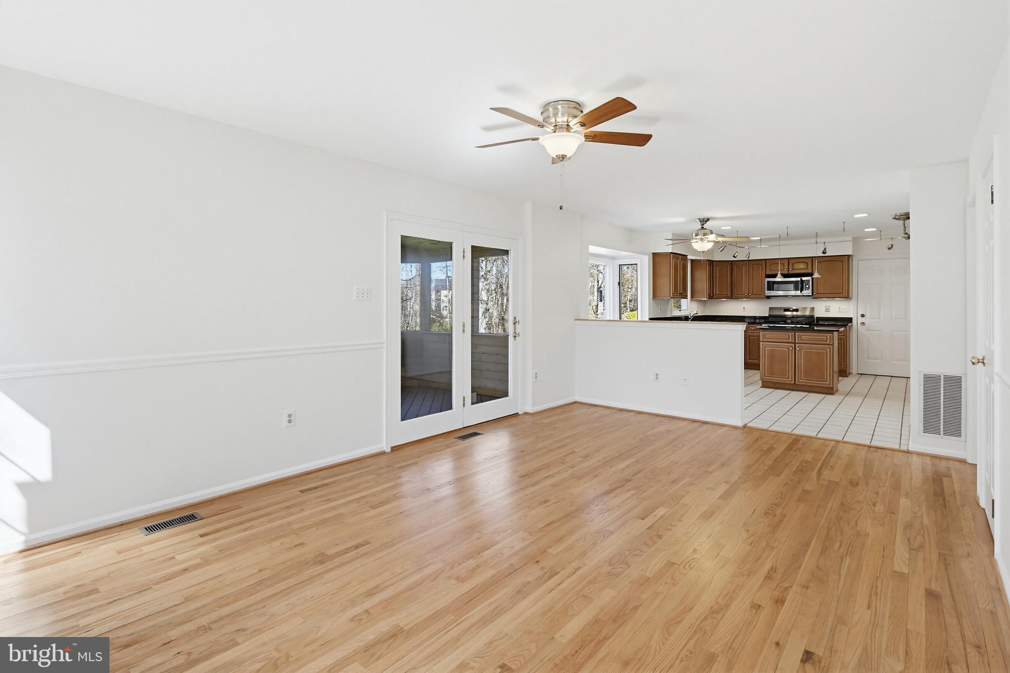 8307 Spring Blossom Court Laurel, MD 20723 - Photo 24 of 69 a view of a kitchen from the hallway