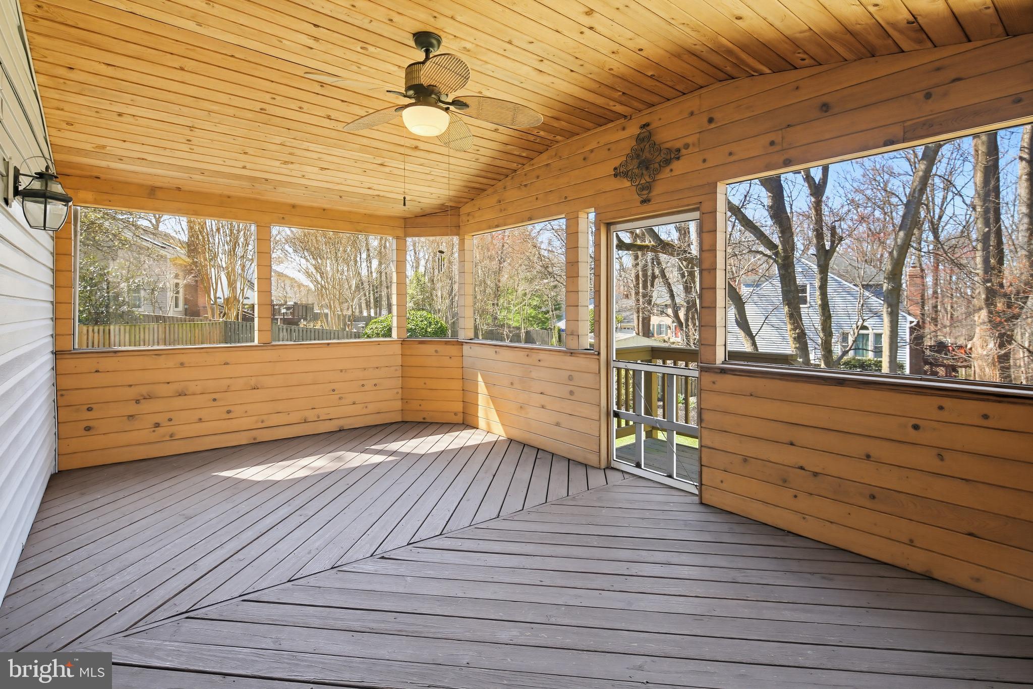 8307 Spring Blossom Court Laurel, MD 20723 - Photo 26 of 69 Screened-in porch with wooded views!
