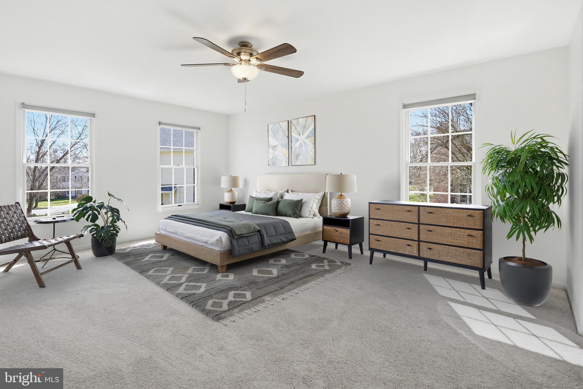 8307 Spring Blossom Court Laurel, MD 20723 - Photo 29 of 69 a living room with furniture and a potted plant