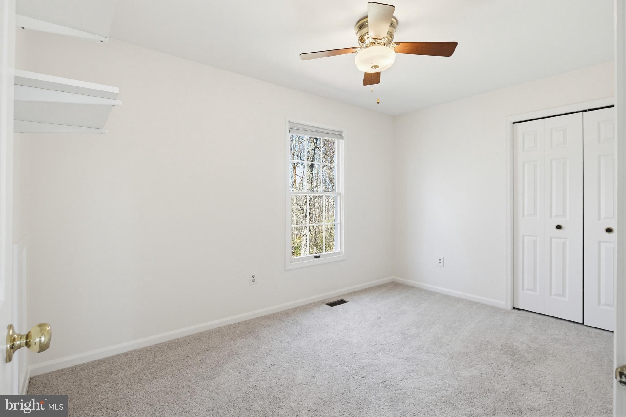 8307 Spring Blossom Court Laurel, MD 20723 - Photo 39 of 69 a view of an empty room with a window