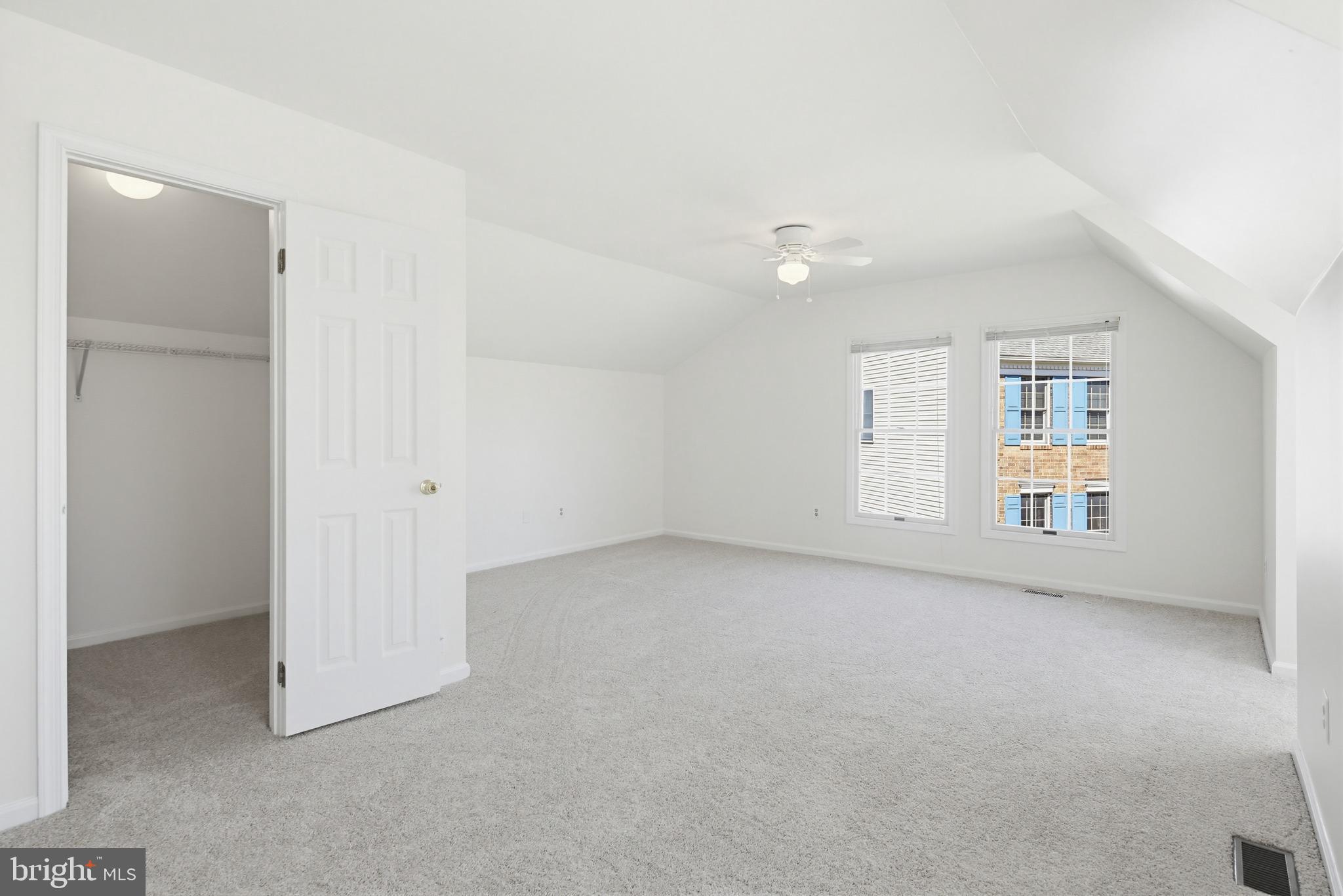 8307 Spring Blossom Court Laurel, MD 20723 - Photo 44 of 69 an empty room with windows and entrance