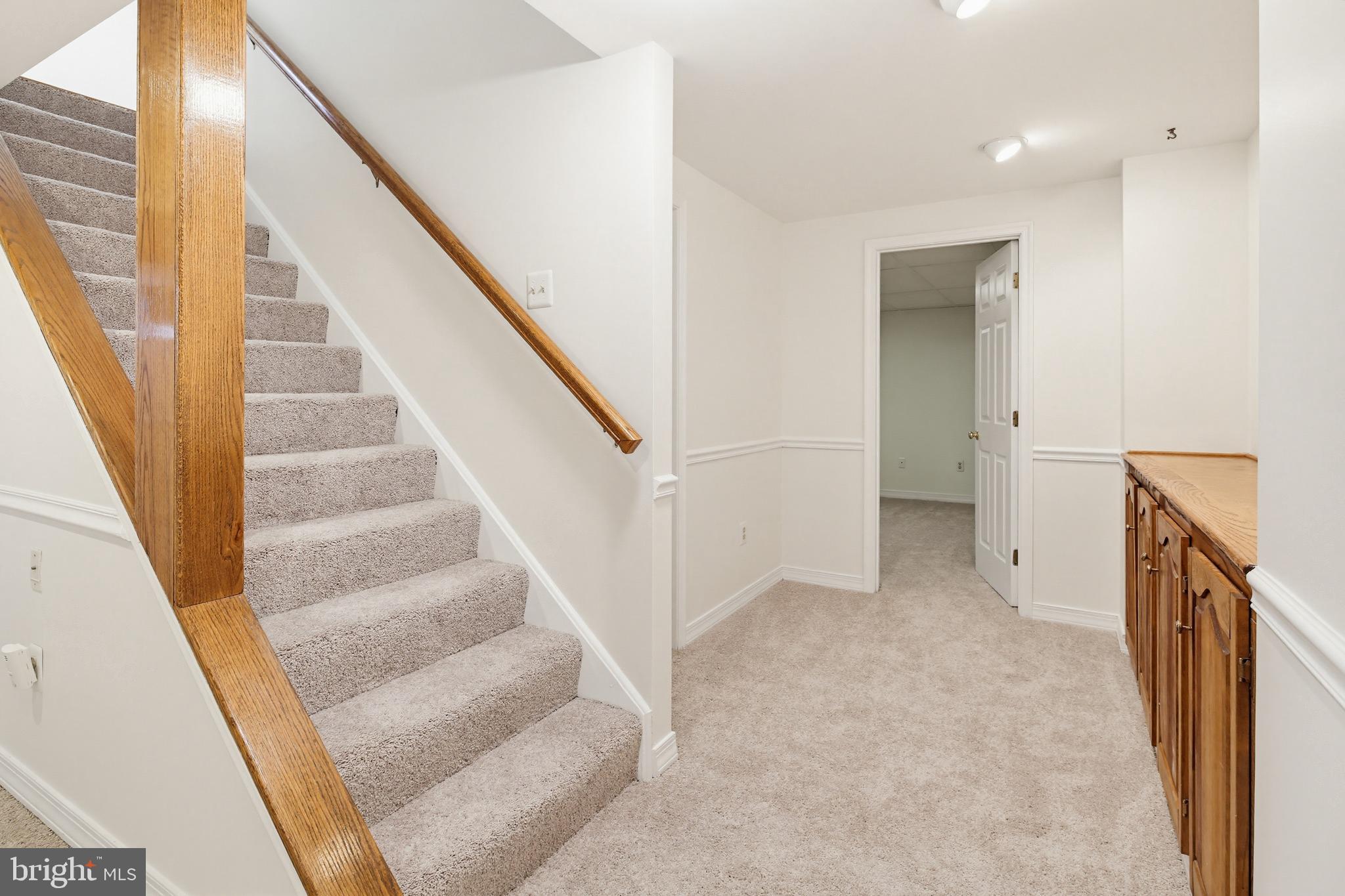 8307 Spring Blossom Court Laurel, MD 20723 - Photo 49 of 69 a view of entryway and hall with wooden floor