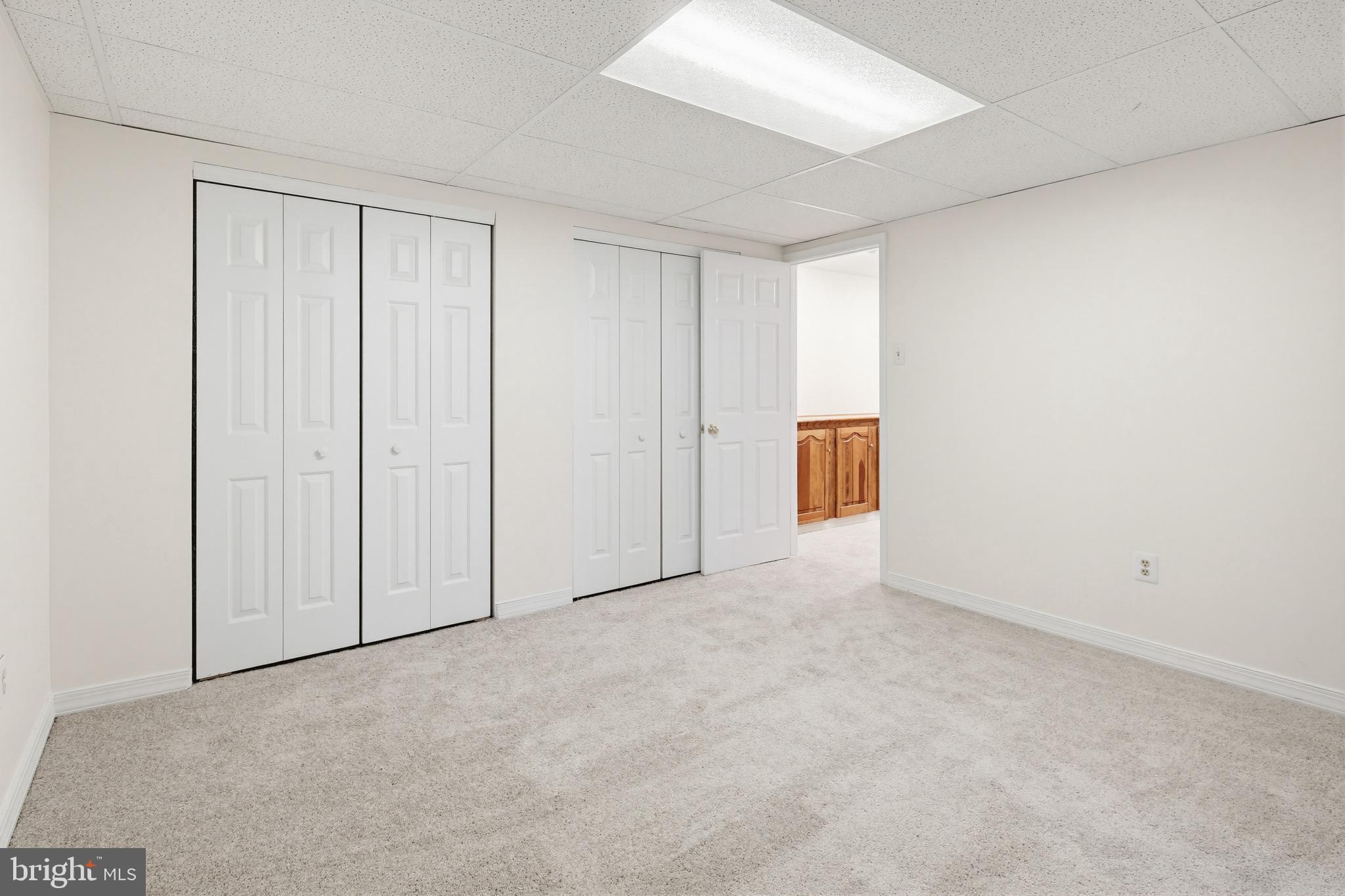 8307 Spring Blossom Court Laurel, MD 20723 - Photo 56 of 69 an empty room with windows