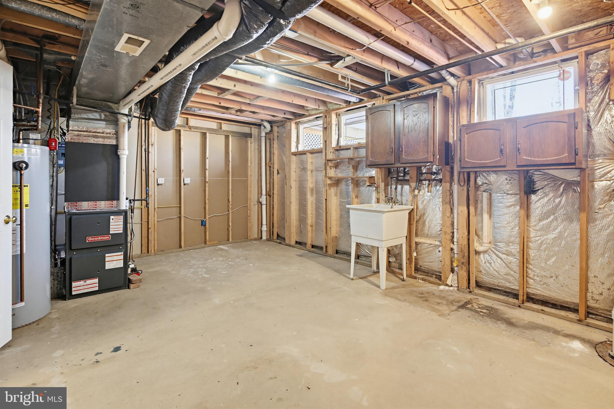 8307 Spring Blossom Court Laurel, MD 20723 - Photo 58 of 69 Laundry/utility room with additional storage space