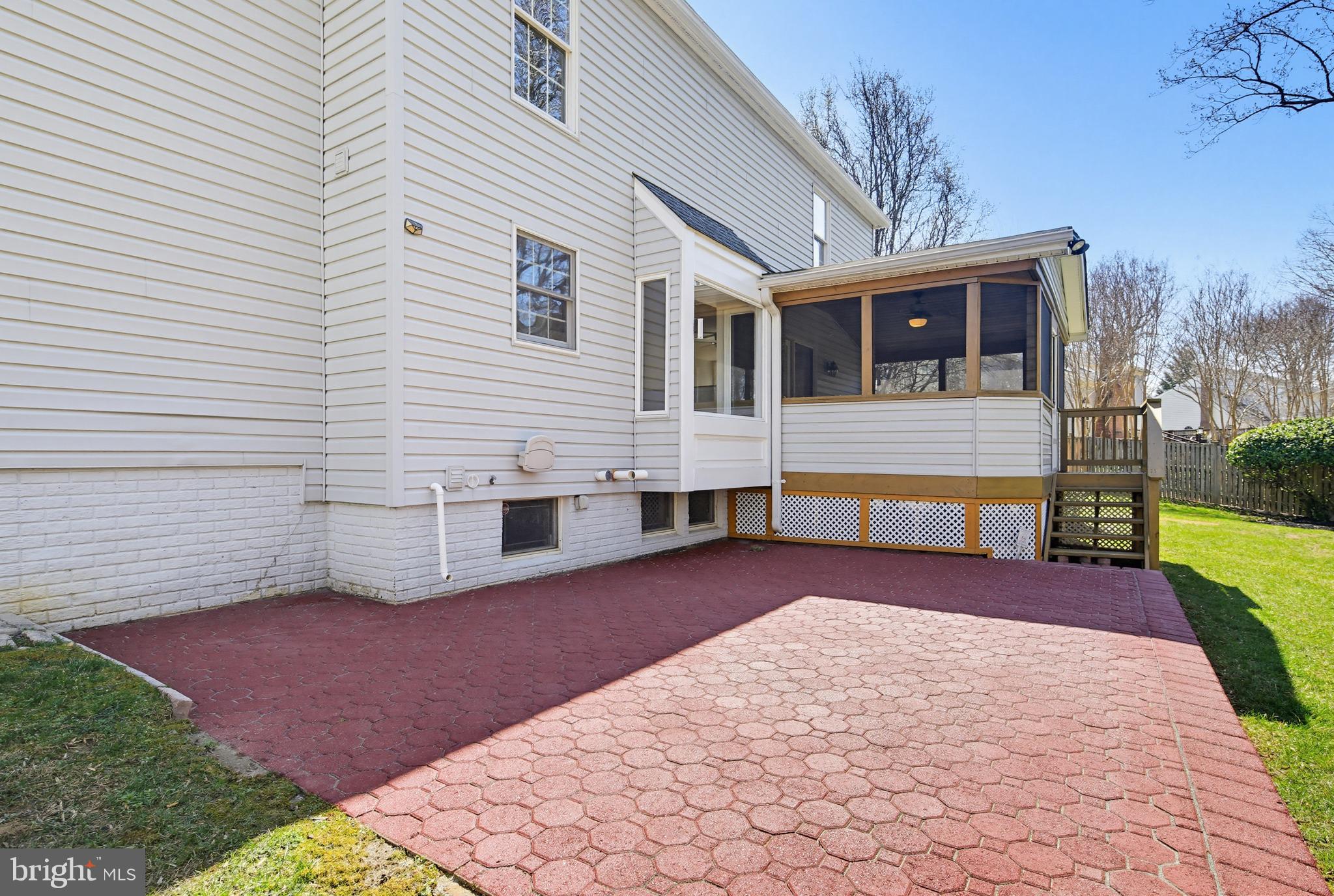8307 Spring Blossom Court Laurel, MD 20723 - Photo 59 of 69 Patio off screened-in porch - freshly painted 2026