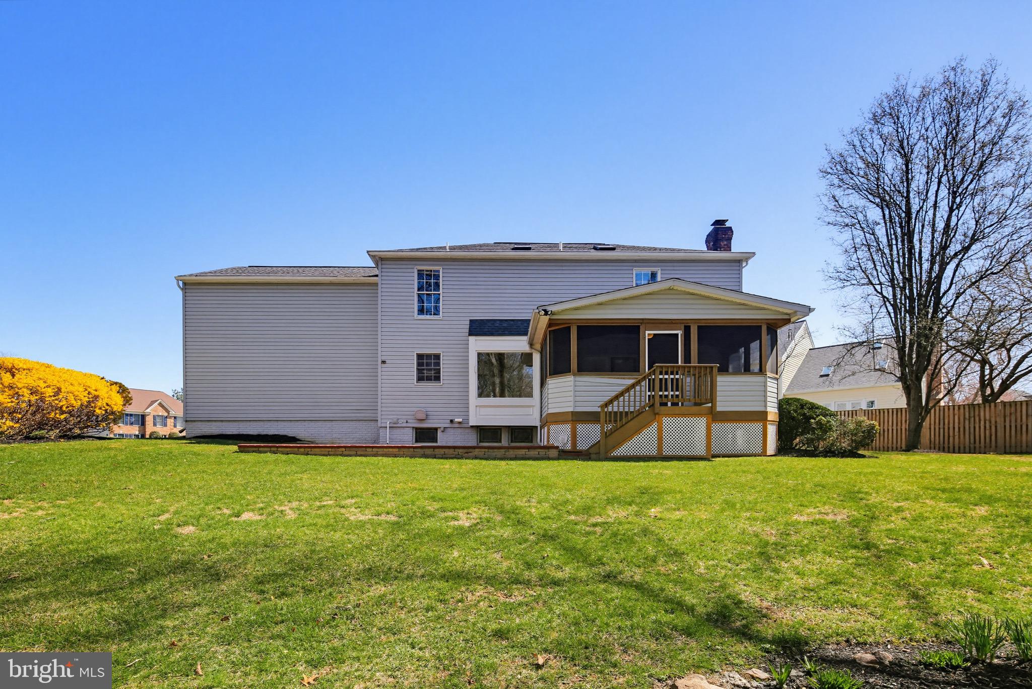 8307 Spring Blossom Court Laurel, MD 20723 - Photo 62 of 69 a front view of a house with a yard