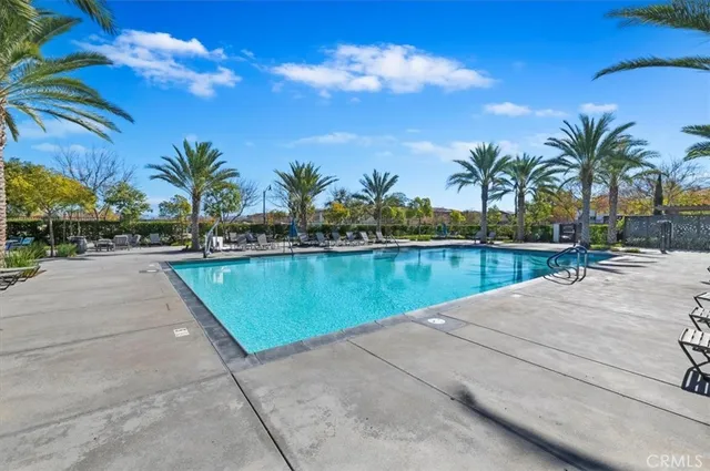 a view of swimming pool with a yard