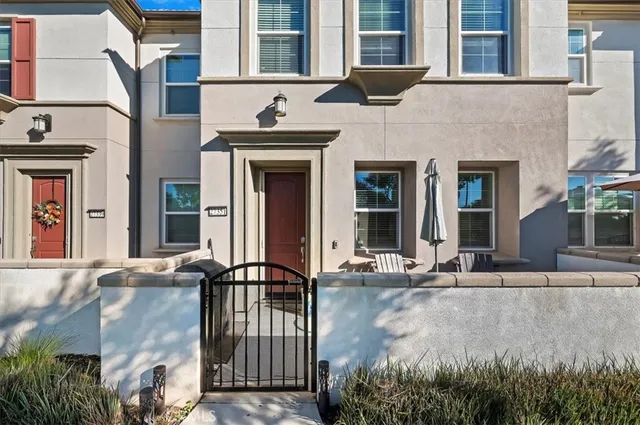 a view of a brick building with many windows
