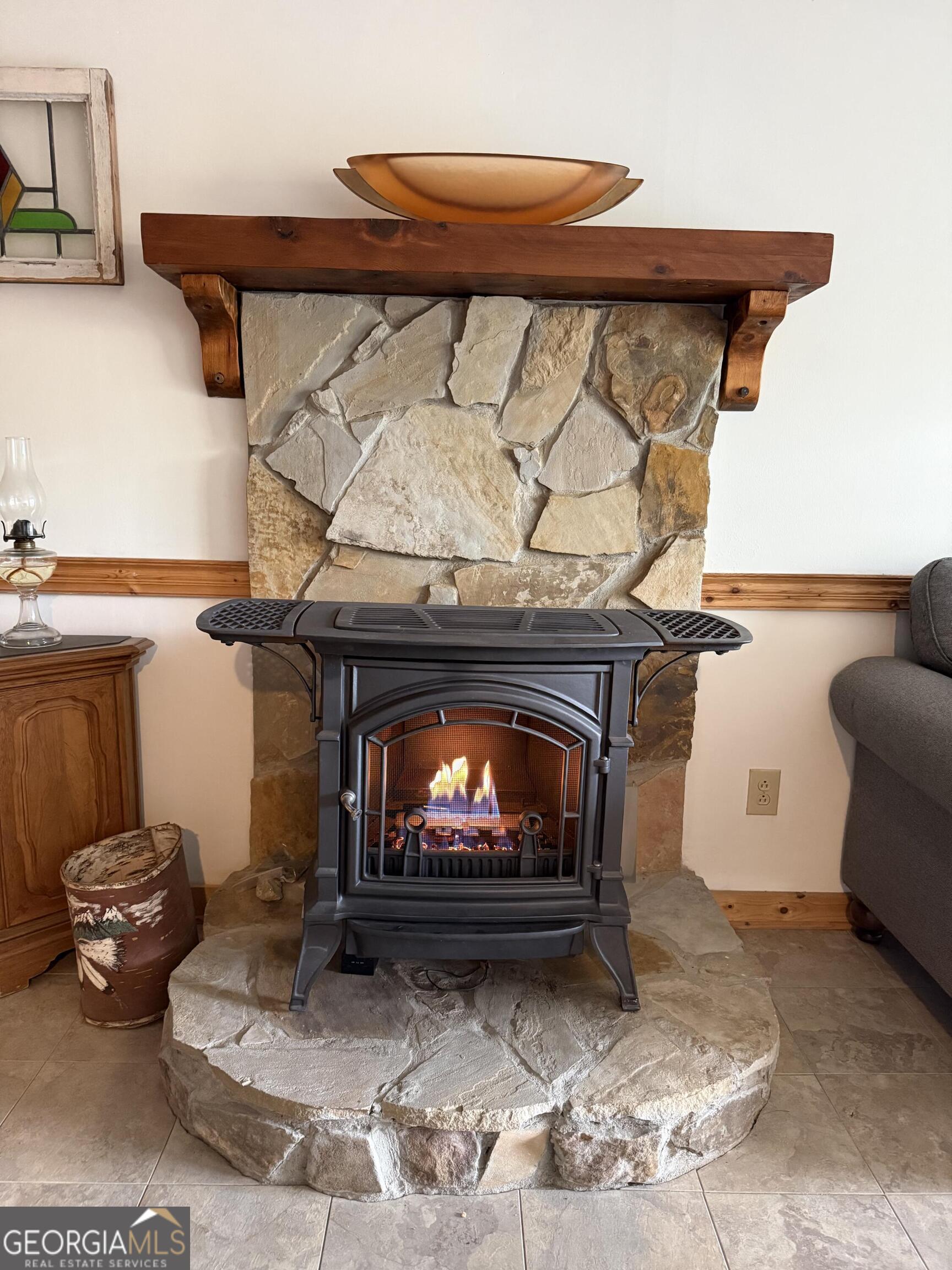 44 Cessna Lane Rabun Gap, GA 30568 - Photo 16 of 27 a living room with furniture and a fireplace