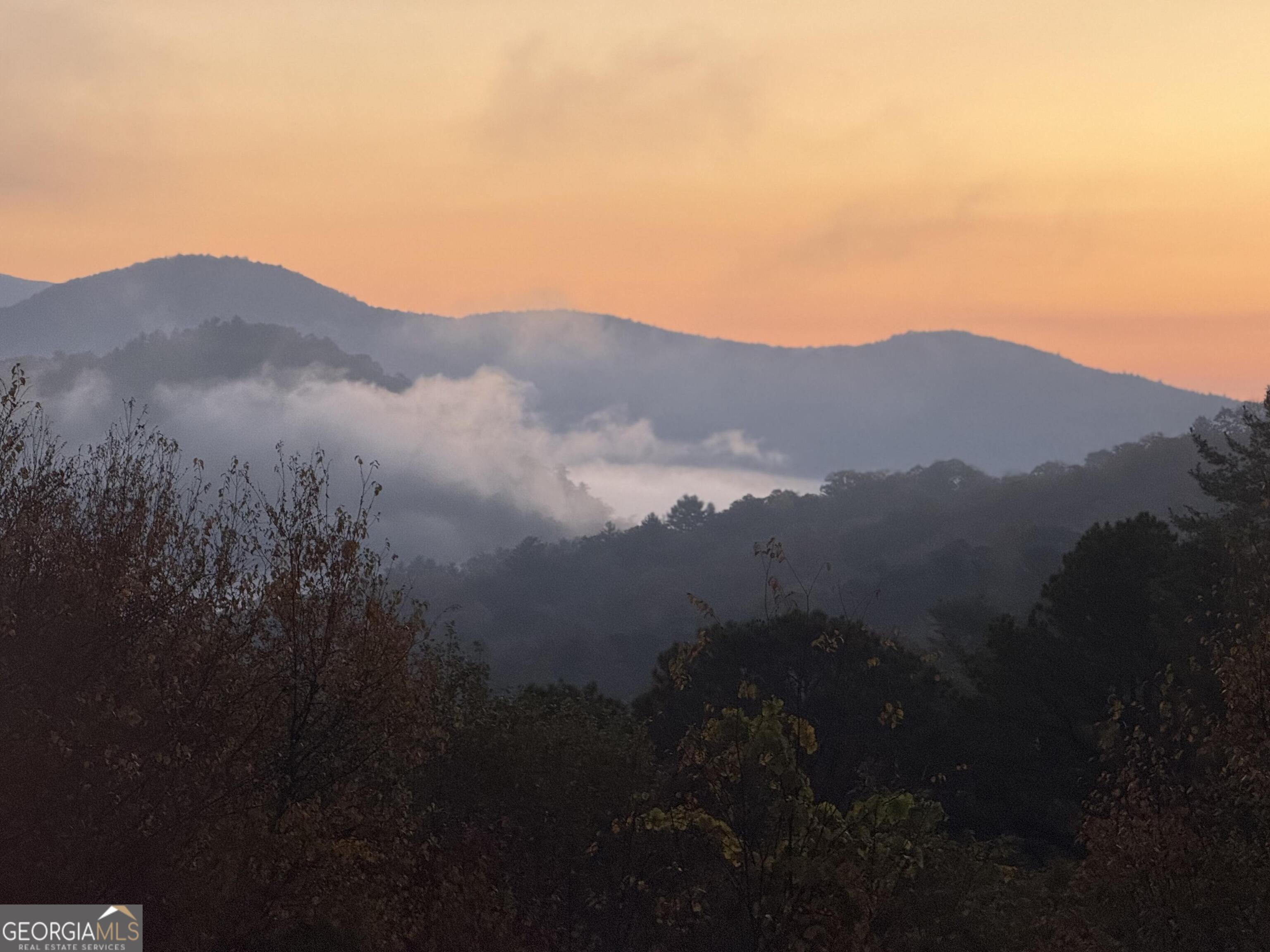 44 Cessna Lane Rabun Gap, GA 30568 - Photo 3 of 27 a view of a town with mountains in the background