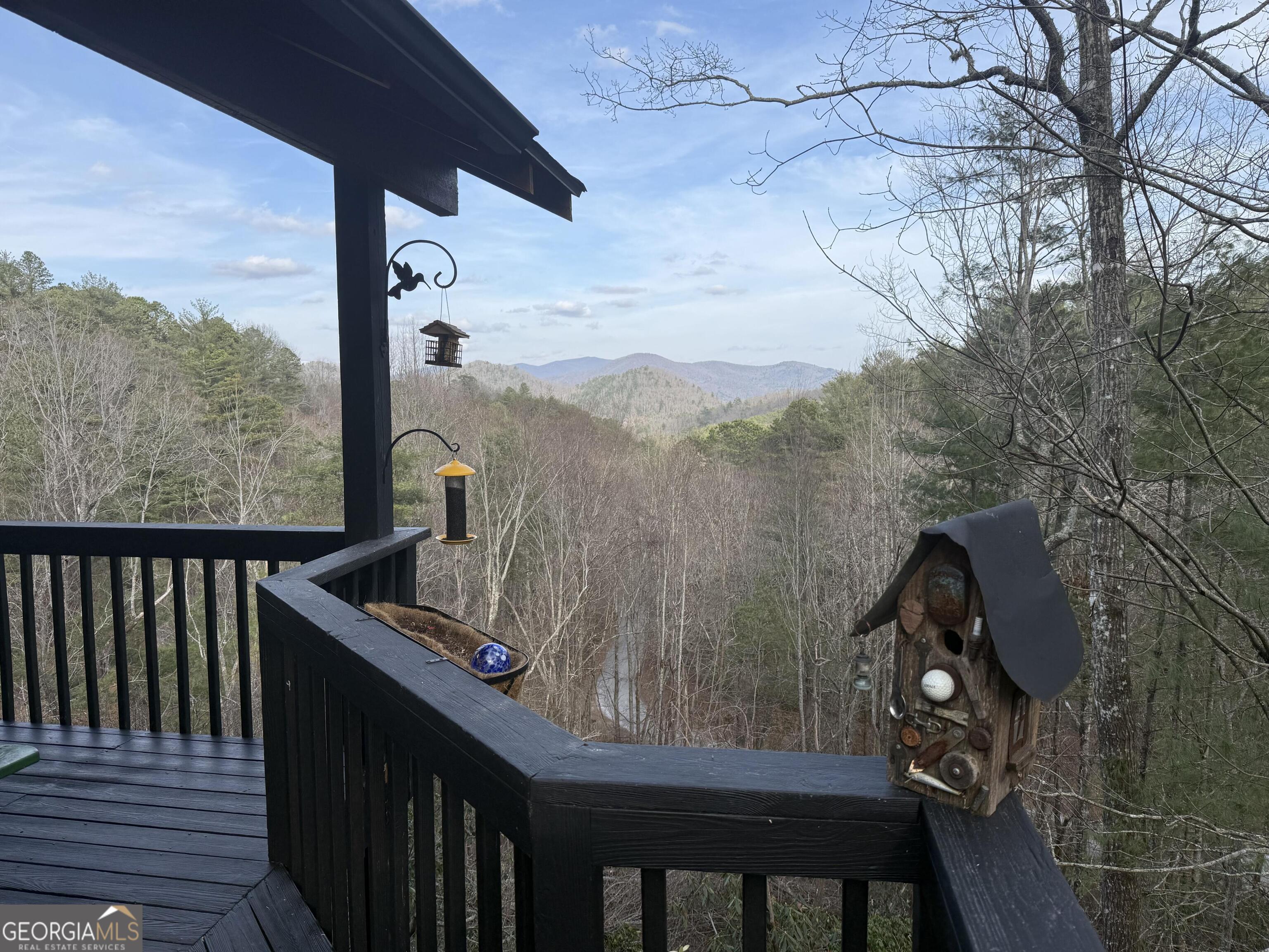44 Cessna Lane Rabun Gap, GA 30568 - Photo 5 of 27 a view of a balcony with furniture