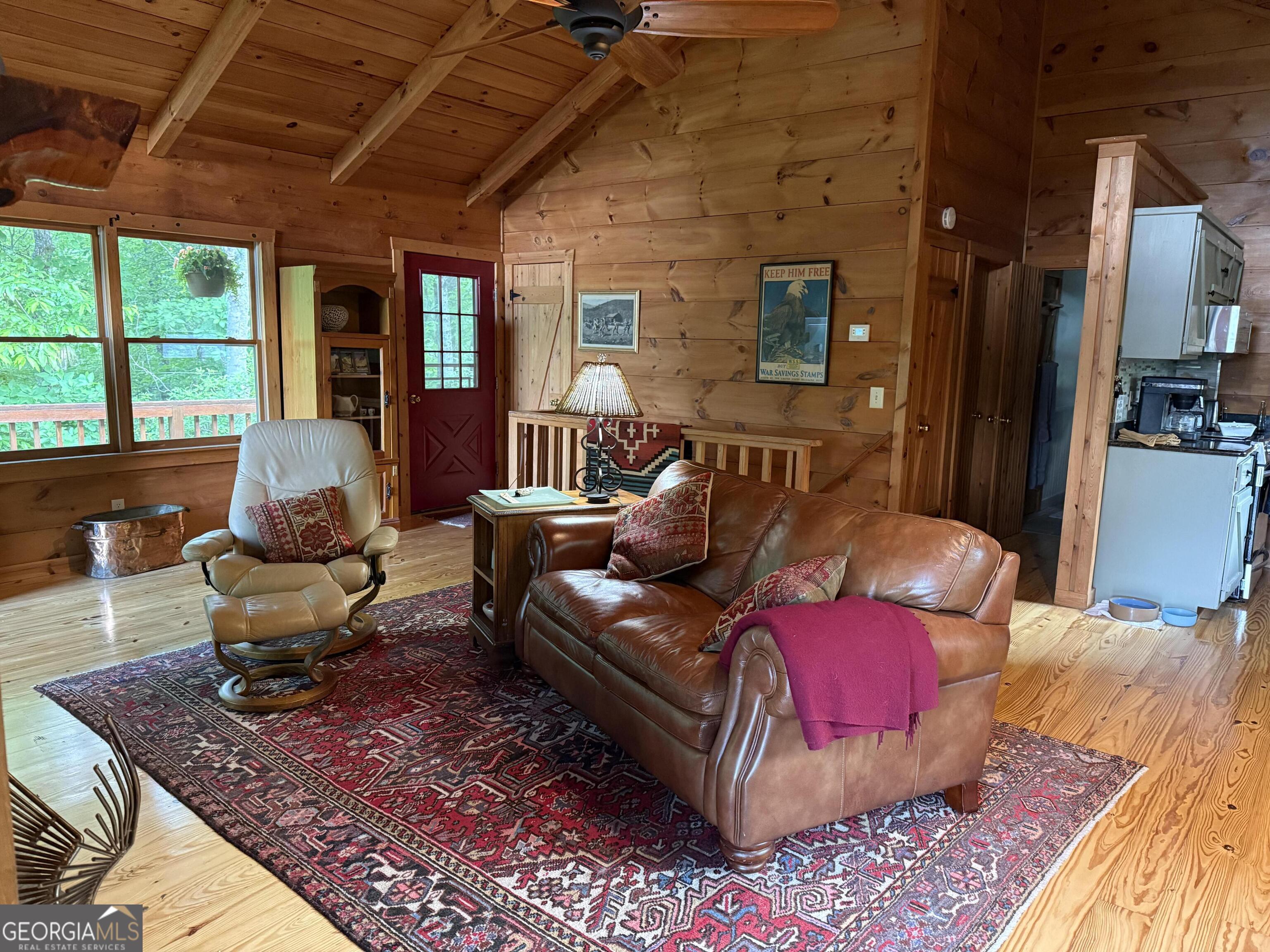 44 Cessna Lane Rabun Gap, GA 30568 - Photo 7 of 27 a living room with furniture and a window