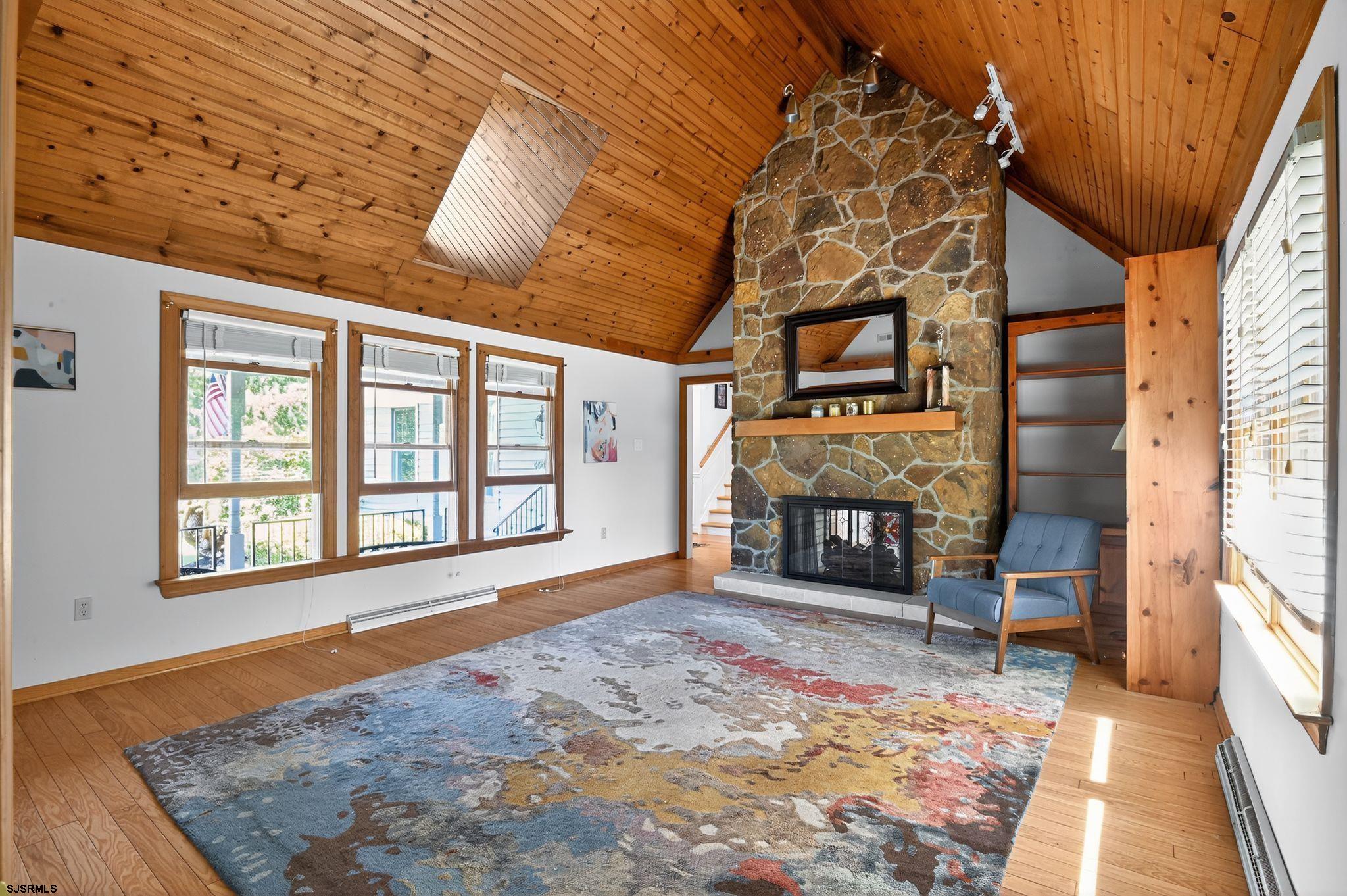 404 Cedarbrook Lane Linwood, NJ 08221 - Photo 12 of 33 a view of a livingroom with wooden floor and furniture