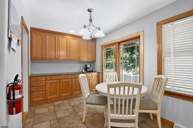 a view of a dining room with furniture