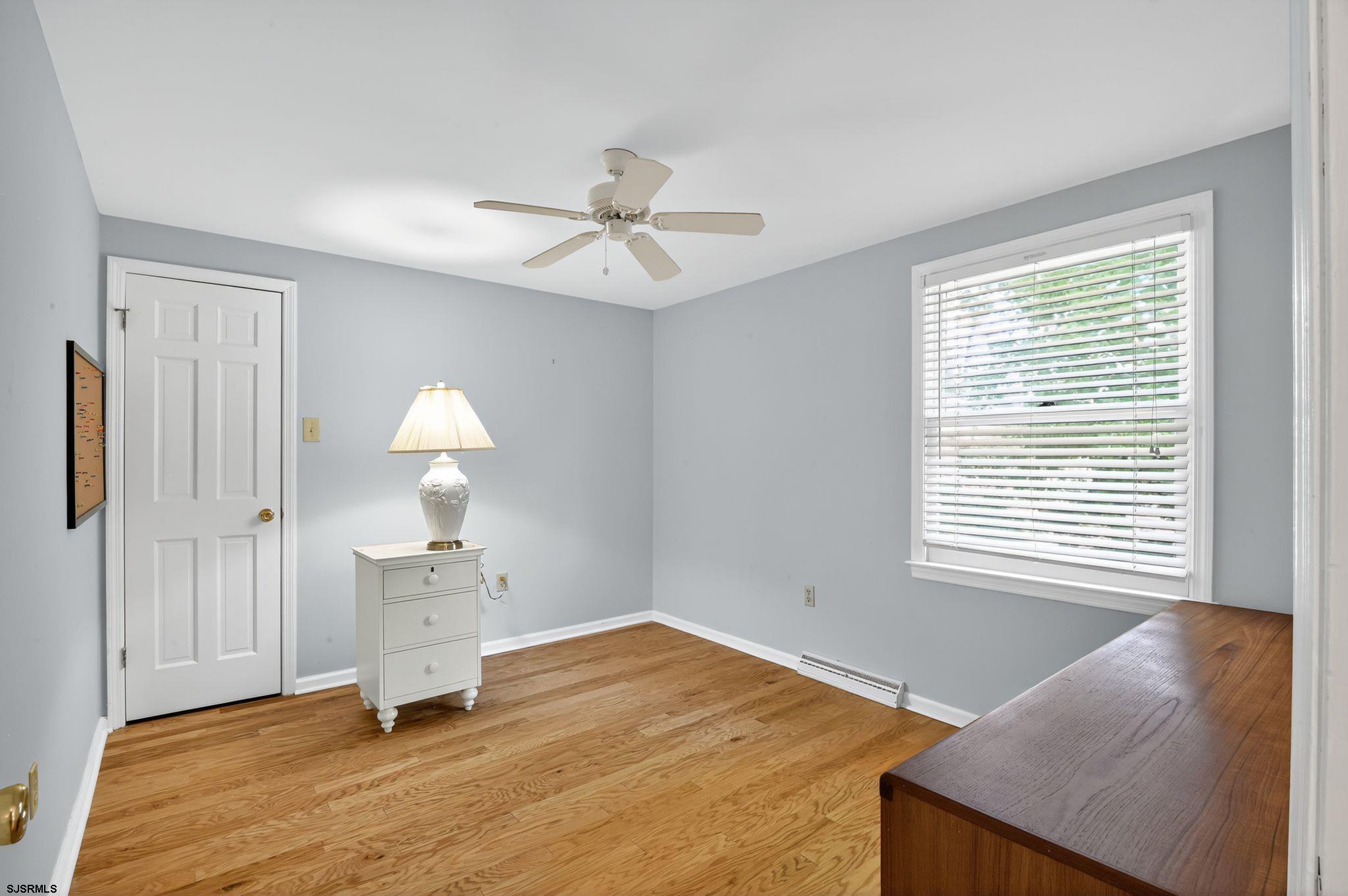 404 Cedarbrook Lane Linwood, NJ 08221 - Photo 24 of 33 a view of an empty room with a window