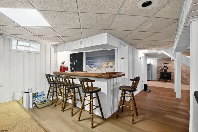 a bathroom with a sink a toilet and a shower