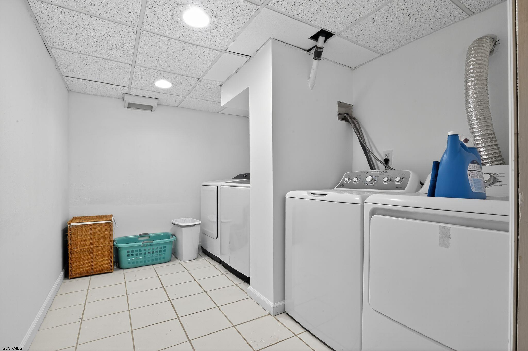 404 Cedarbrook Lane Linwood, NJ 08221 - Photo 30 of 33 a bathroom with a sink a toilet and a shower