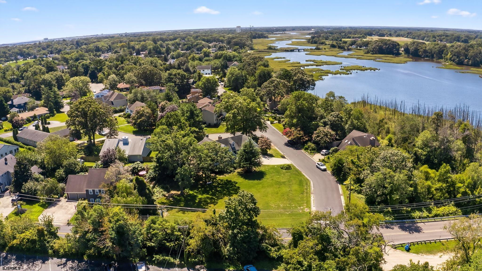 404 Cedarbrook Lane Linwood, NJ 08221 - Photo 6 of 33 an aerial view of residential houses with outdoor space