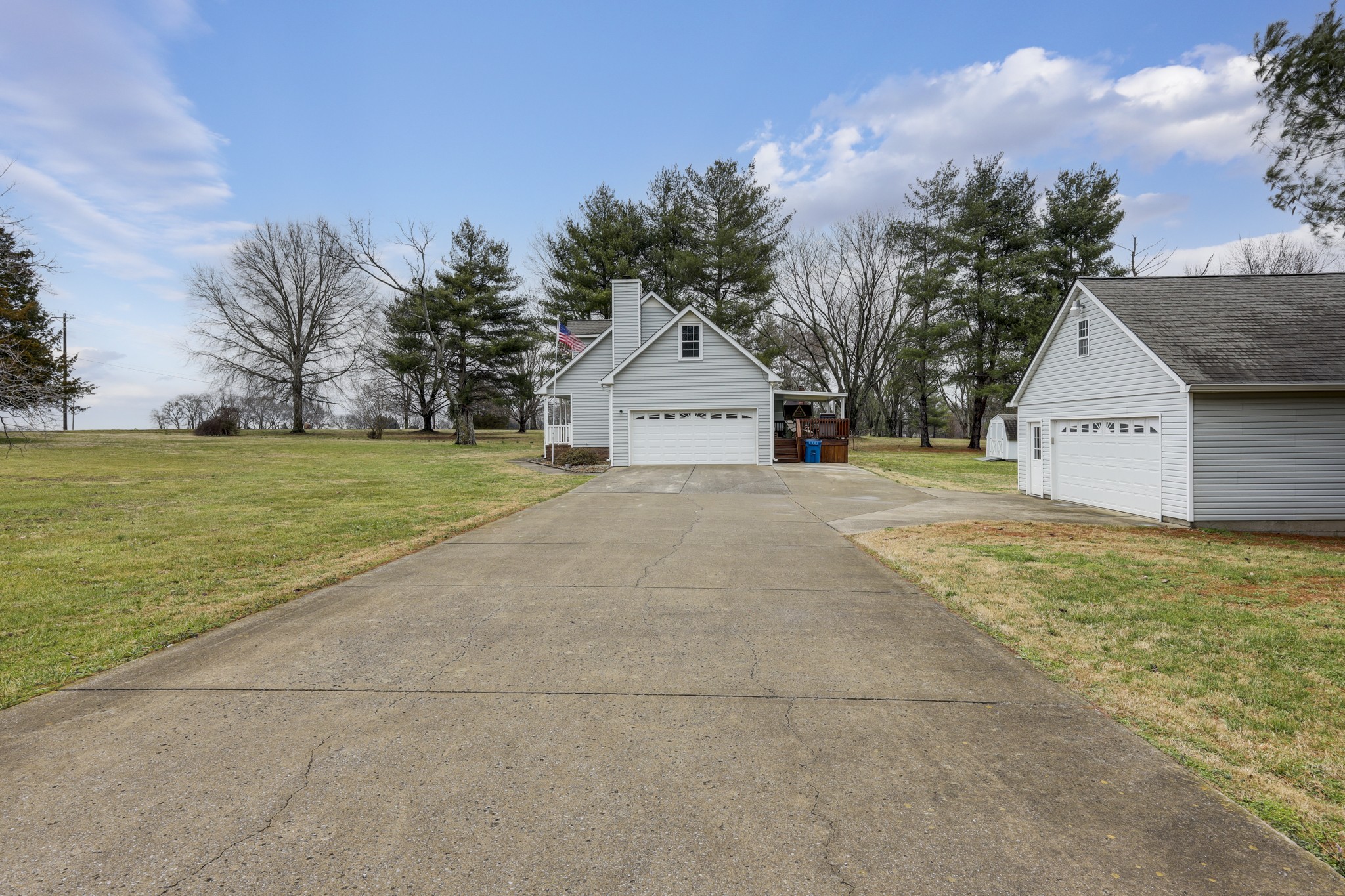 5113 Baker Road Murfreesboro, TN 37129 - Photo 15 of 17 a view of a house with a yard and a garage