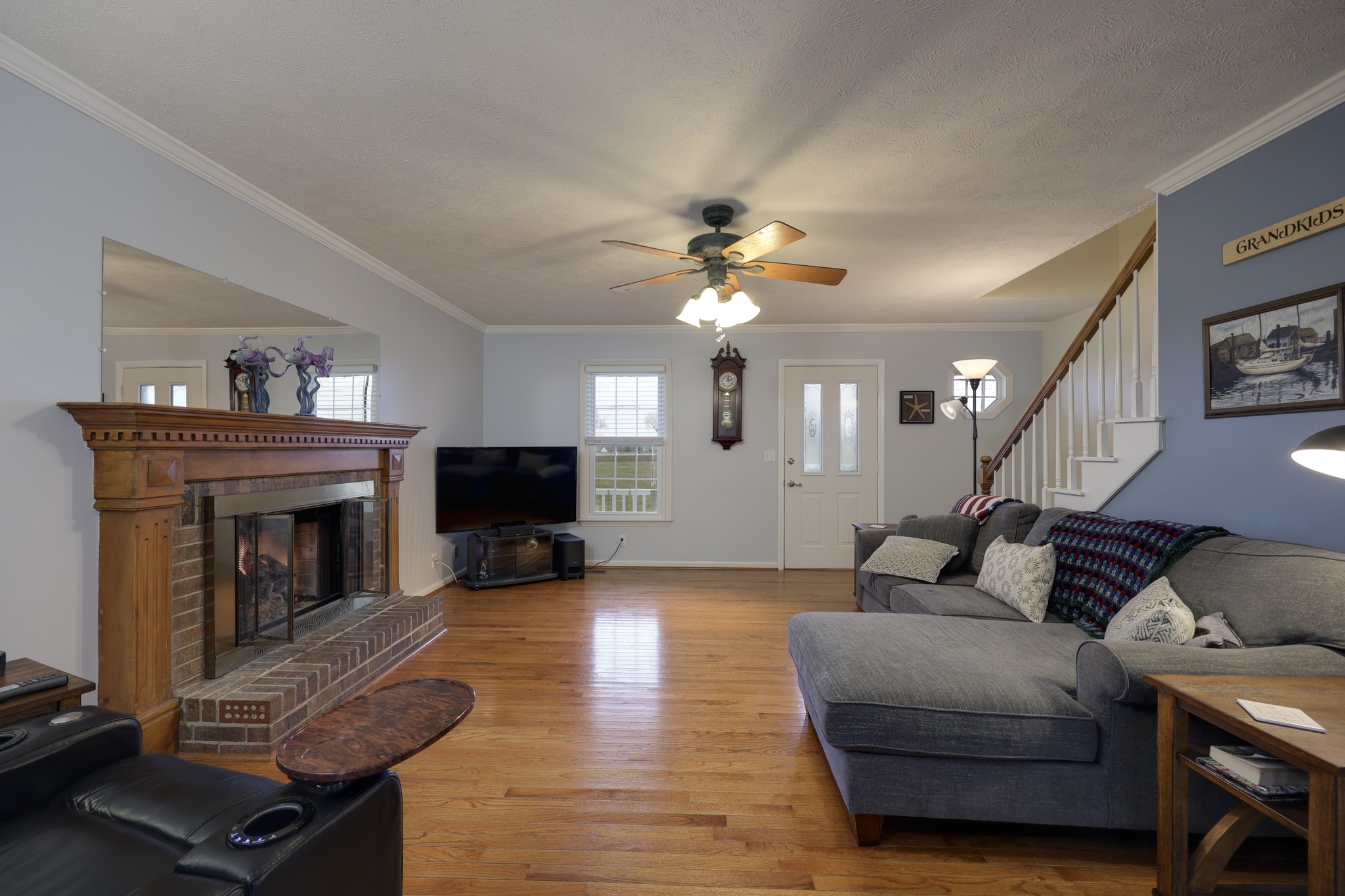 5113 Baker Road Murfreesboro, TN 37129 - Photo 3 of 17 a living room with furniture and a fireplace