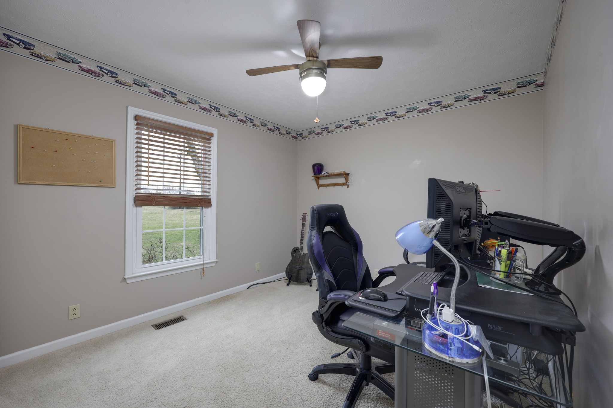 5113 Baker Road Murfreesboro, TN 37129 - Photo 8 of 17 a view of a workspace with furniture and a window