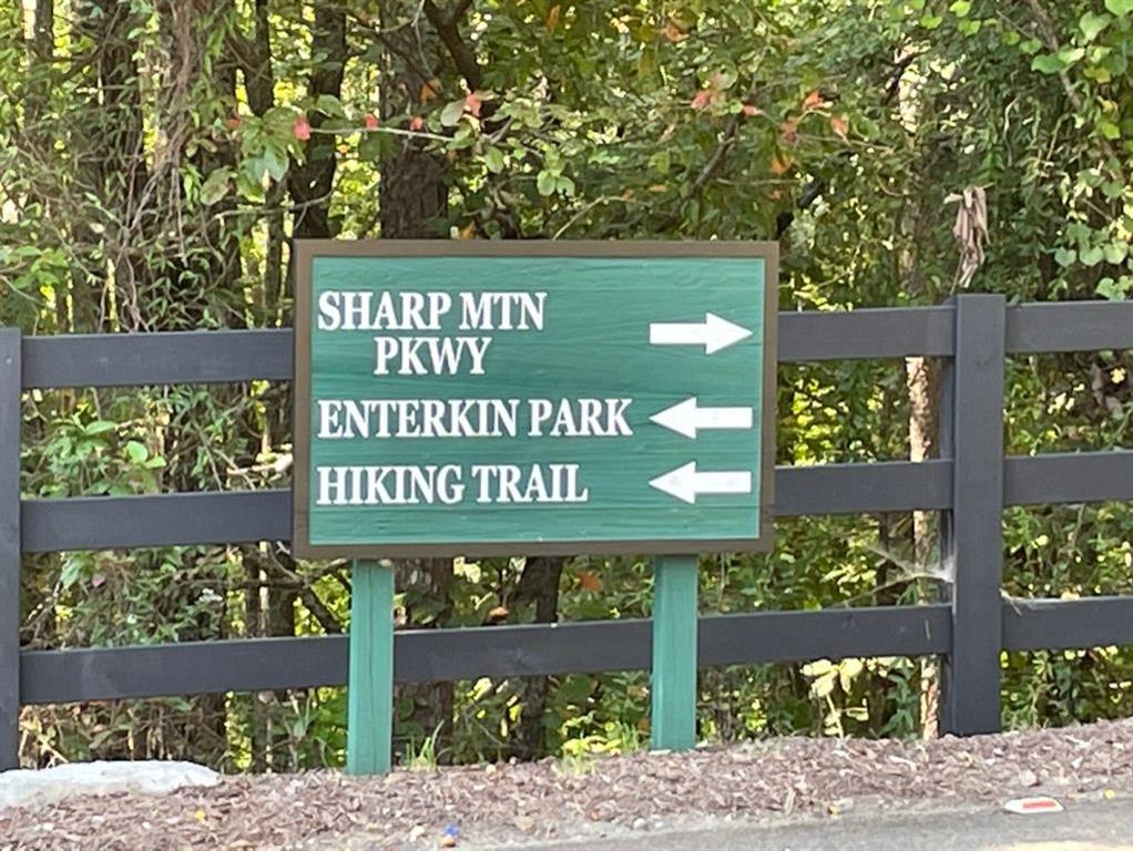 76 Tally Cv Road Jasper, GA 30143 - Photo 22 of 31 a sign on the side of a building