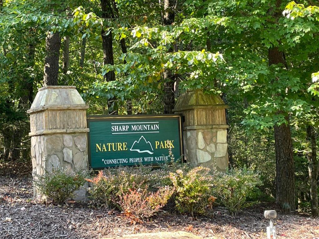 76 Tally Cv Road Jasper, GA 30143 - Photo 24 of 31 a sign on the side of a road