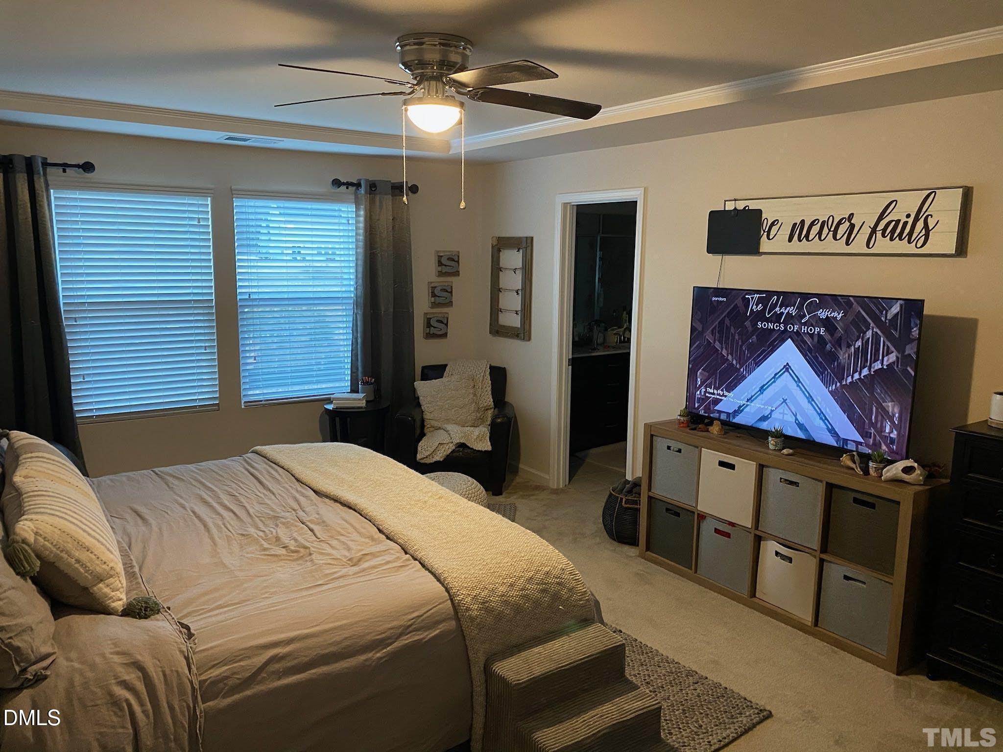 2613 Lacebark Pine Road Raleigh, NC 27616 - Photo 8 of 15 a bedroom with a bed and a painting on the wall